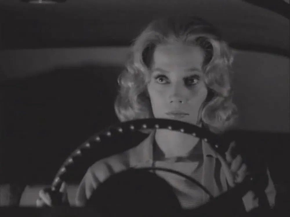 Can't run, can't hide, but do try!: Candance Hiligoss hits the road in "Carnival of Souls" / Photo courtesy of Fesfilm.