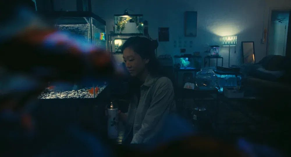 Sink or swim: Tiffany Chu contemplates the fruits of her trauma in "Fishtank" / Photo courtesy of Parallax Films and HollyShorts.